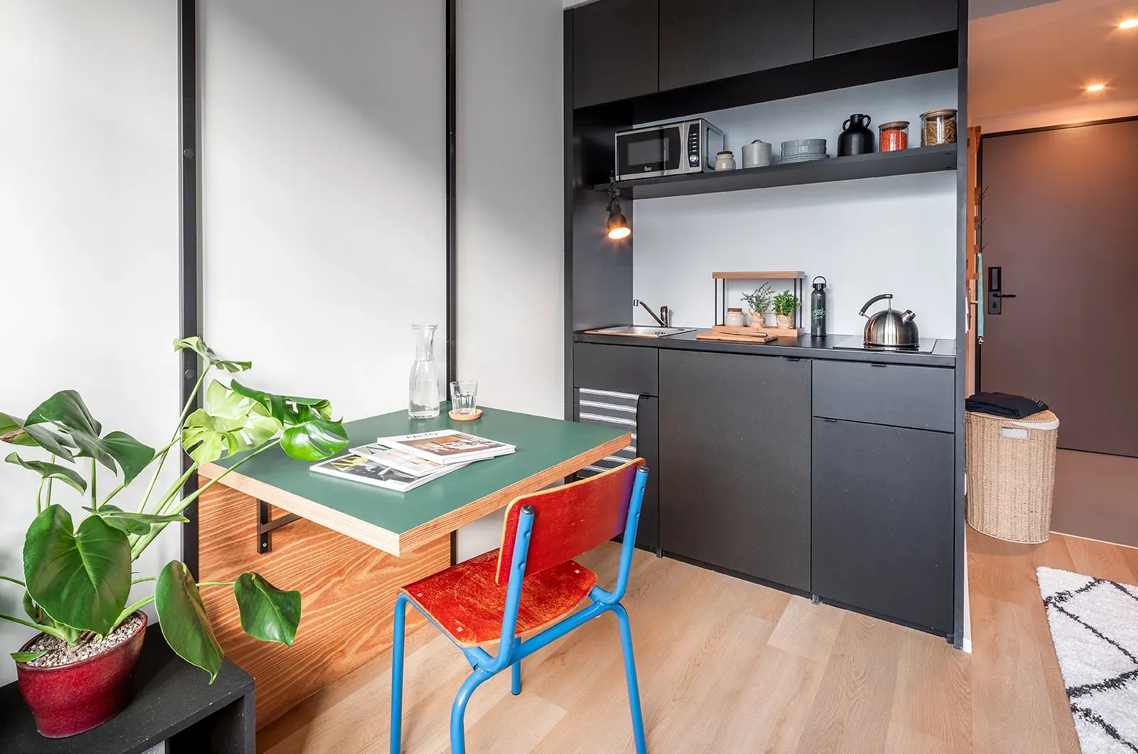 Styled kitchen and dining area in a Classic Room at Neon Wood Berlin Frankfurter Tor showing decorated space and personalization example