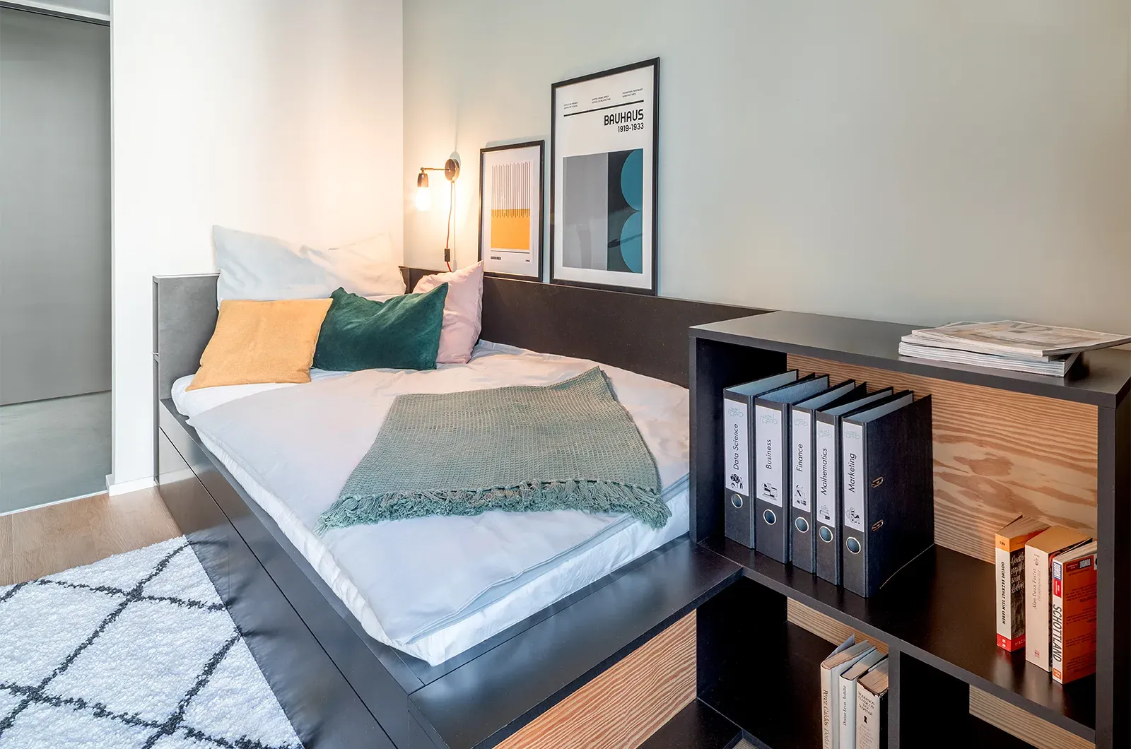 Styled bed area in a Classic Room at Neon Wood Berlin Mitte-Wedding showing decorated sleeping space and personalization example