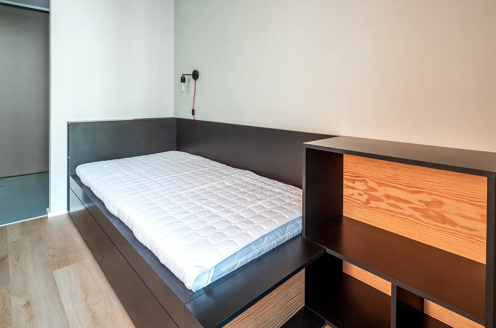 Undecorated bed area in a Classic Room at Neon Wood Berlin Mitte-Wedding showing furnished baseline without styling accents