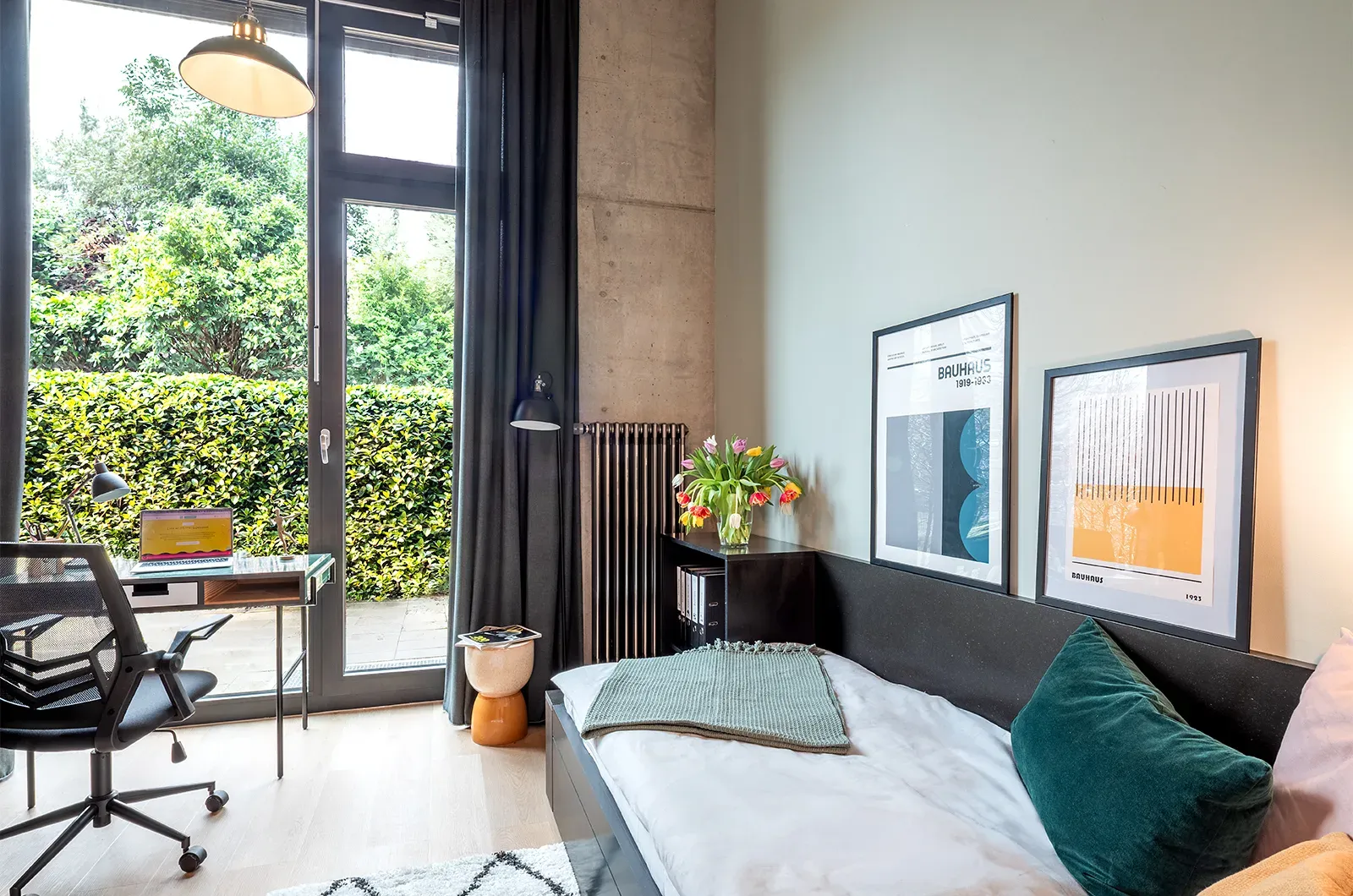 Styled bed area with access to the patio in a Classic Patio Room at Neon Wood Berlin Mitte-Wedding showing decorated sleeping space and personalization example