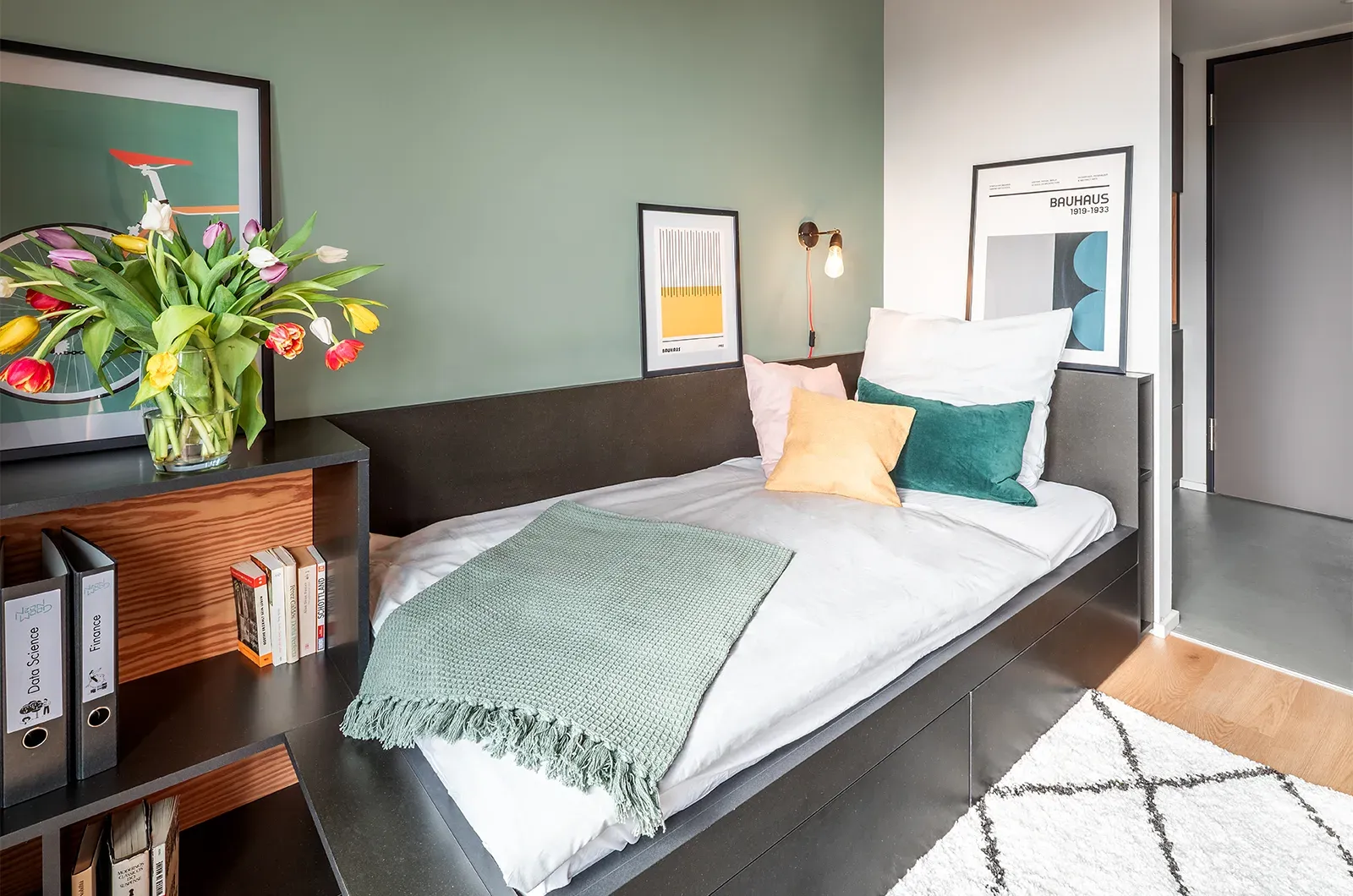 Styled bed area in a Penthouse Room at Neon Wood Berlin Mitte-Wedding showing decorated sleeping space and personalization example