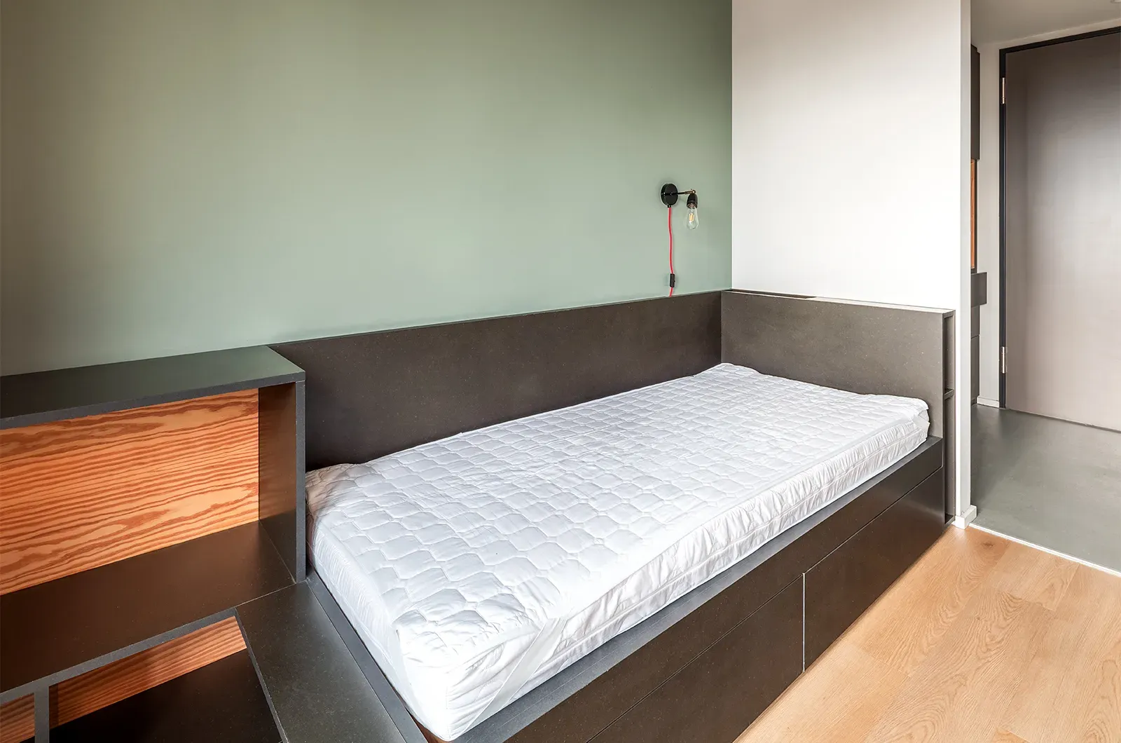 Undecorated bed area in a Penthouse Room at Neon Wood Berlin Mitte-Wedding showing furnished baseline without styling accents