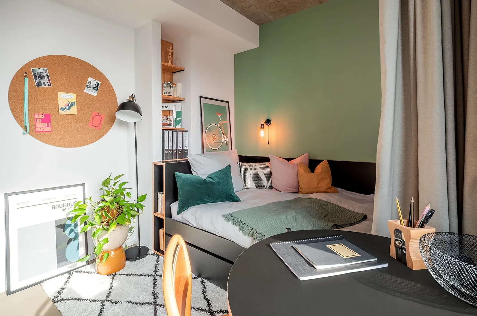 Styled bed area in a Penthouse Balcony Room at Neon Wood Frankfurt Riedberg showing decorated sleeping space and personalization example