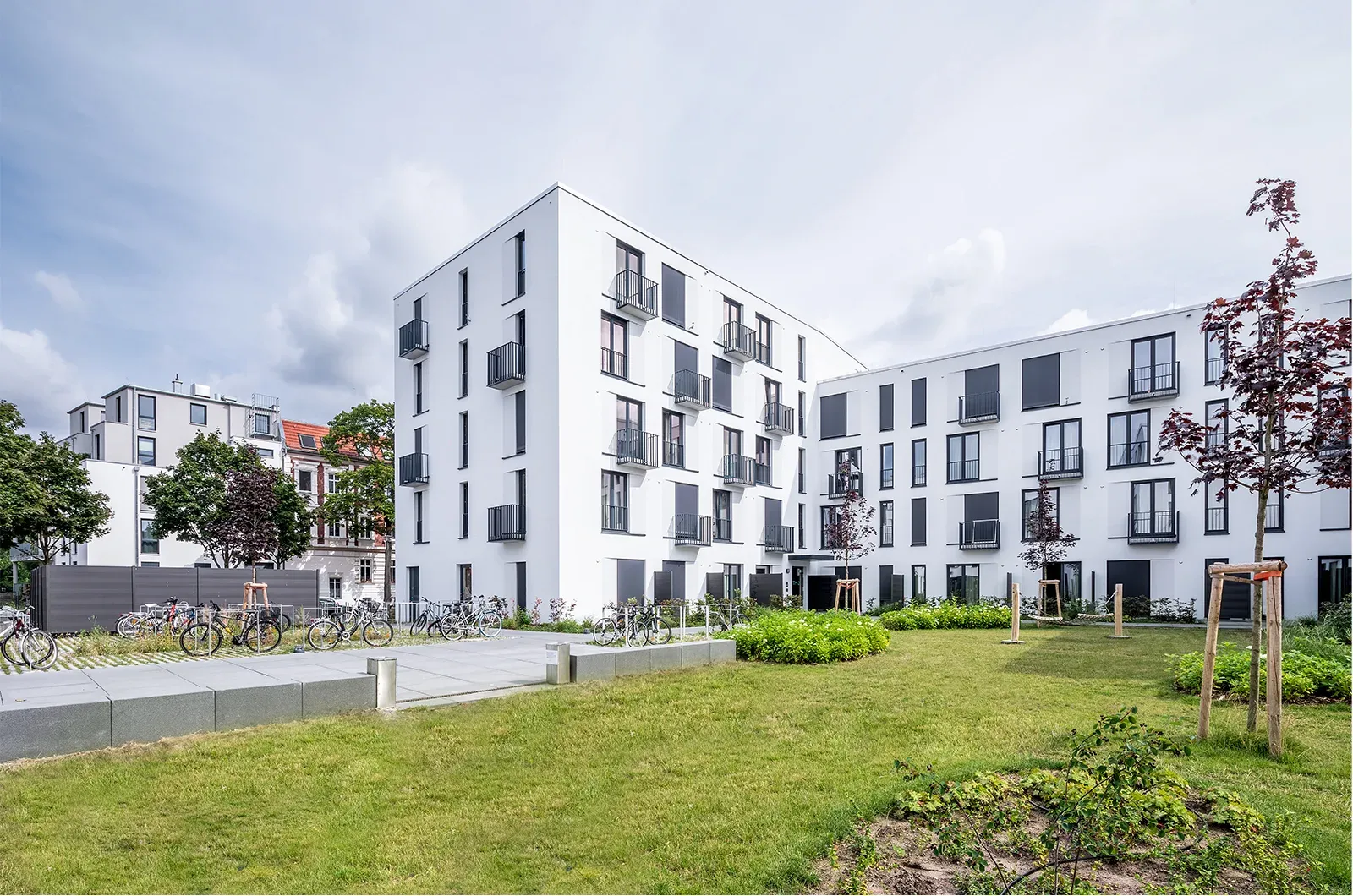 Exterior view of the Neon Wood Berlin Adlershof student housing complex displaying the modern architecture and residential building design